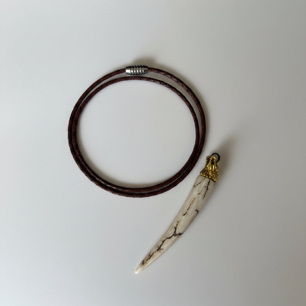 Necklace with a decorative pendant on a white background