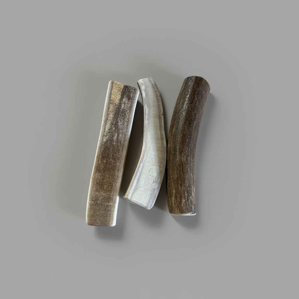 # deer antler dog chews package on a gray background