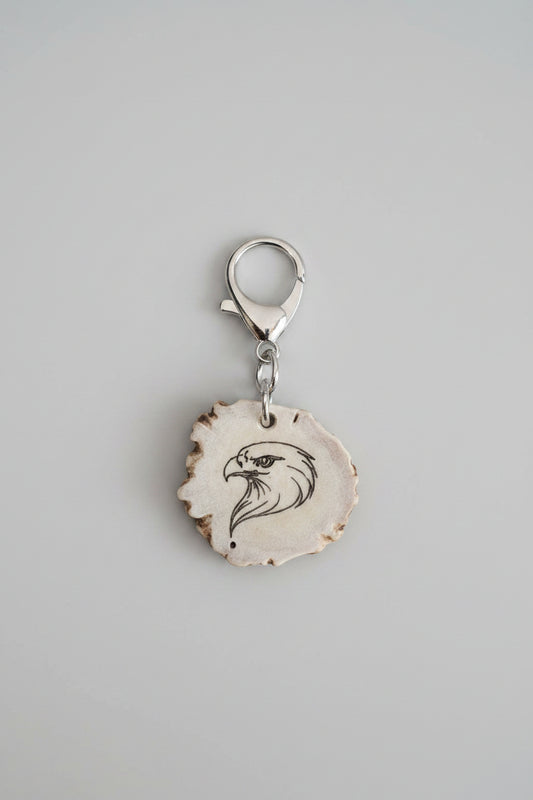Silver keychain with eagle design on a piece of deer antler
