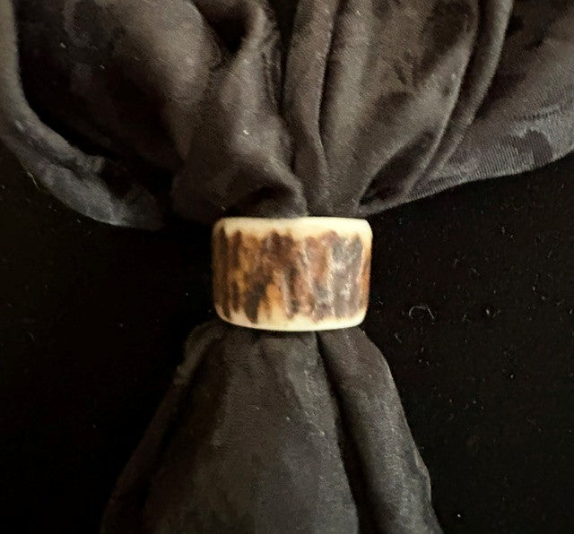 elk antler scarf slice on a dark scarf and black background