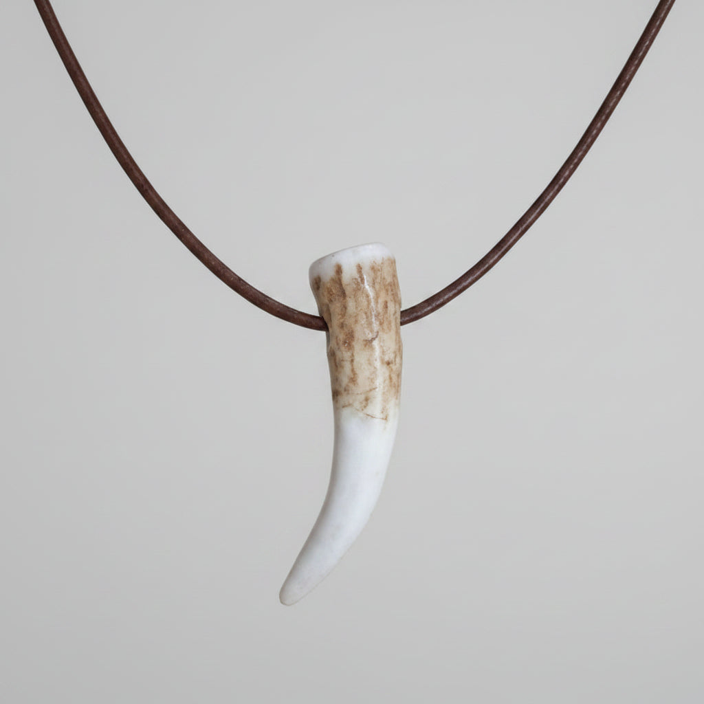 view of the other side of the elk antler tip necklace with aroma diffuser on a gray background 