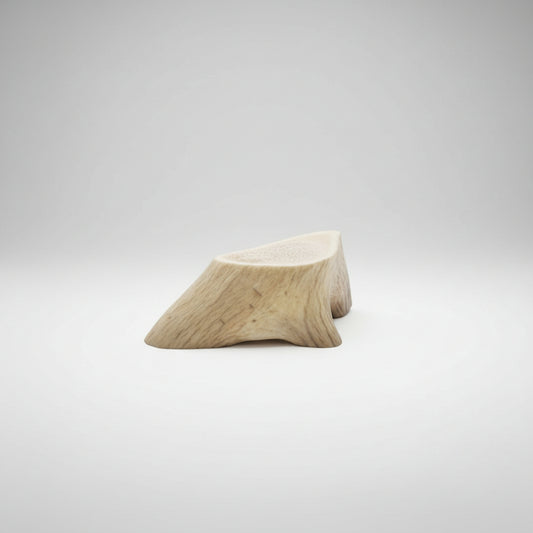 Deer antler aroma diffuser piece on a gray background