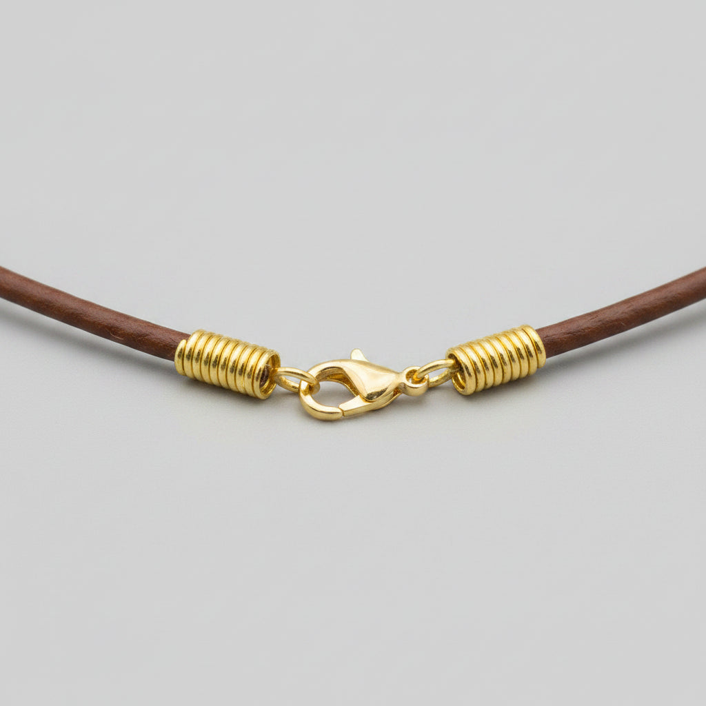 closed up view of the attachment of the elk antler tip necklace with aroma diffuser on a gray background 